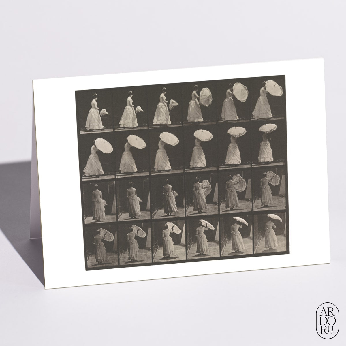 Woman Opening a Parasol by Eadweard Muybridge