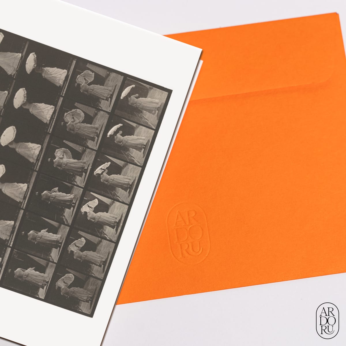 Woman Opening a Parasol by Eadweard Muybridge